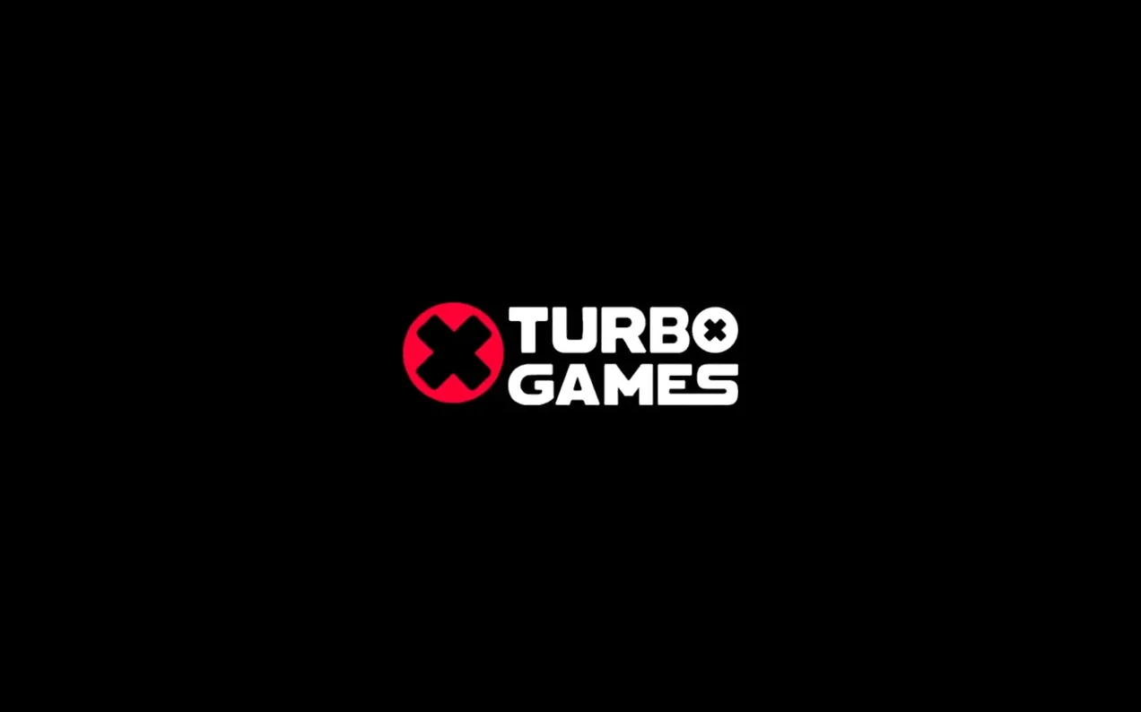 Logo Turbo Games: cerchio rosso con X bianca, scritta bianca su sfondo nero.